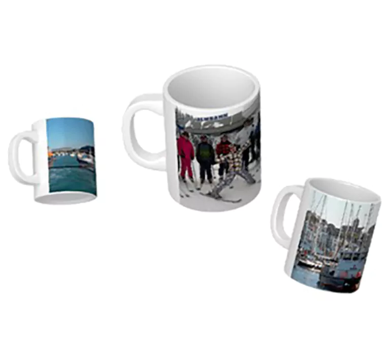 A selection of custom-printed coffee mugs showcasing the diverse designs and personalization options available on our website.